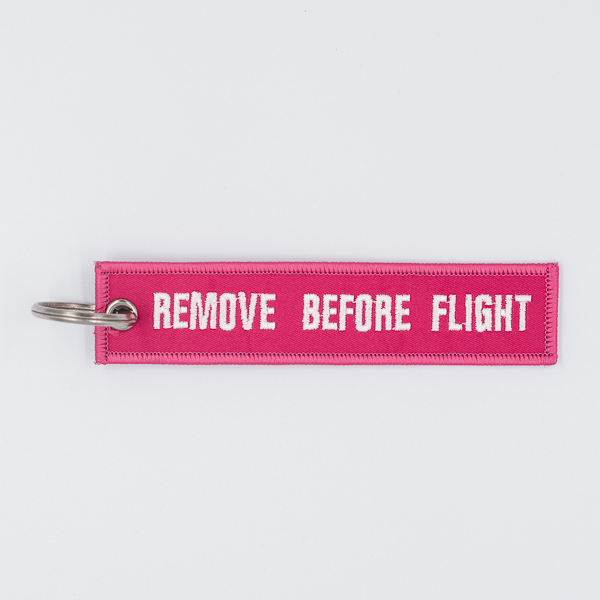 Remove before flight pink tag